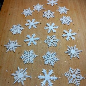 Snowflake ornaments or bag tags